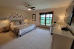 Driveway Entry Level First Floor: Master Suite w/ Queen Bed - En Suite with Tub/Shower Combo